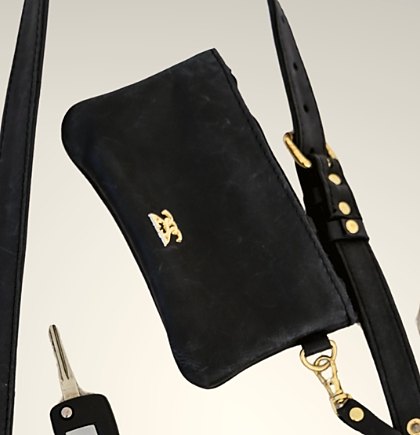 The leather backflap with magnetic closure